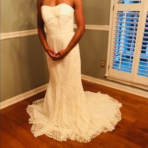 Never been used wedding gown/shoes